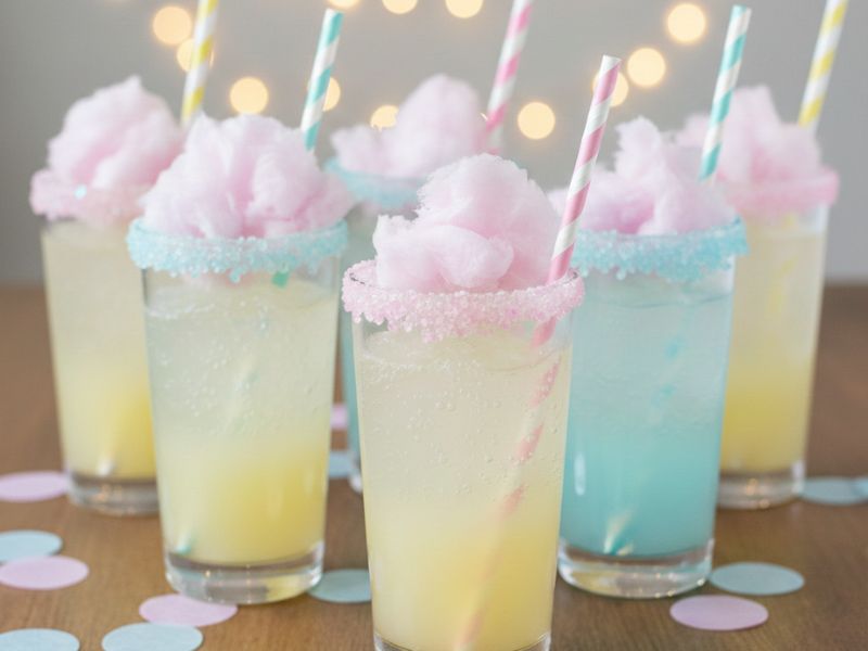 Dye-free cotton candy mocktails served in clear cups for a family party