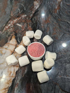 A sprinkle of marshmallow cotton candy sugar on marble. Made with natural dyes and perfect for your next cotton candy creation!