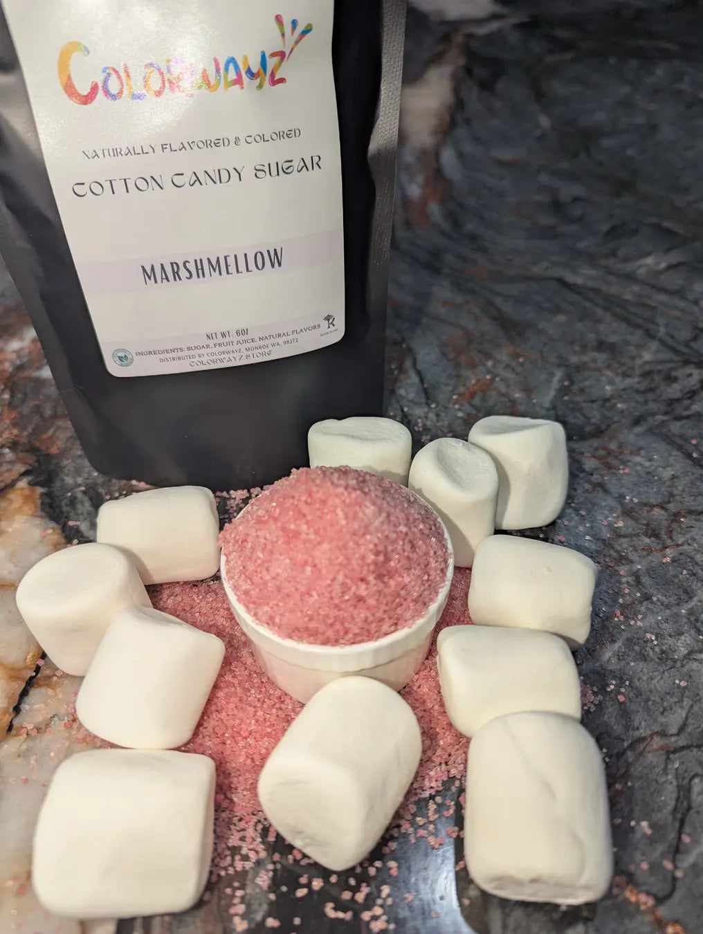 Marshmallow cotton candy sugar surrounded by fluffy marshmallows. Naturally colored, Kosher, and ideal for candy floss or creative desserts!