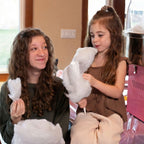 Kids holding fresh blueberry cotton candy made with Colorwayz dye-free cotton candy sugar, family-friendly natural cotton candy at home